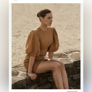 dissh orange dress Introducing Stevie  Featuring a halter neckline with a tailored waistband,  designed in a orange stripe linen blend.  A bold statement in our classic  shape.  Explore new season online and